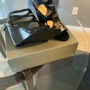 Black leather wedge shoes by Levity size 9.5
